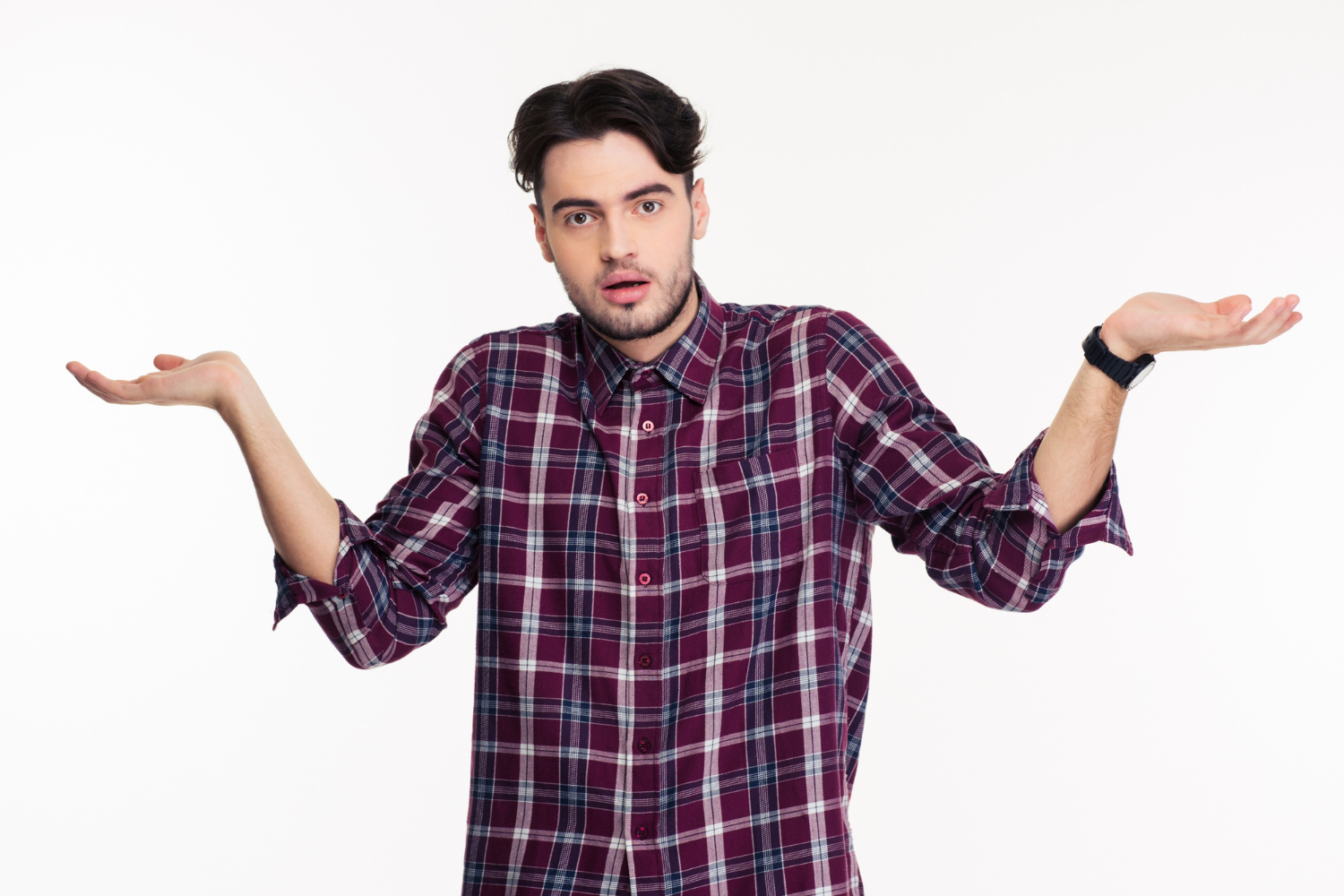 portrait-young-man-shrugging-shoulders-holding-copyspace-palms-isolated-white-wall